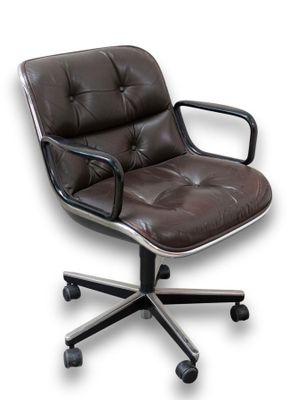 brown leather office chair with black metal frame and casteors