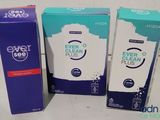 three boxes of ever clean plus and ever clean plus on a table