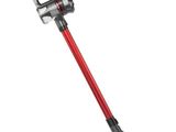 un aspirateur sans fil rouge avec une poignée rouge