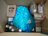 a box filled with bottles and other items that are in it