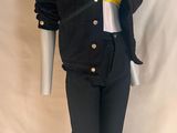 black and yellow jacket and pants on a mannequin mannequin mannequin mannequin mannequin mannequin mannequin mannequin