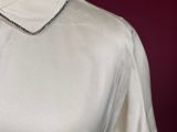 a mannequin on a mannequin with a name on it