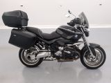 bmw motorcycle parked in a clean room with no one on it