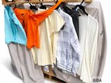 a wooden rack with clothes hanging on it