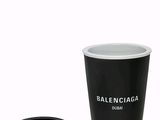 a black cup with a lid and a lid on it