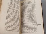 an open book that is sitting on a table