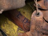 a close up of a baseball glove with a tag on it