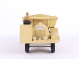 a toy truck with a man in the back of it