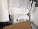 a box of toilet paper and a box of toilet paper on the floor