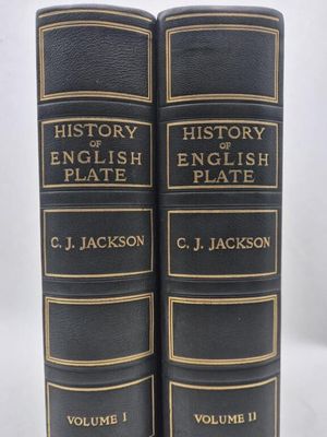 a pair of black books sitting on top of each other