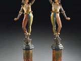 pair of bronze and marble figurines of a woman and a man