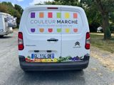 a van that is parked on the side of the road