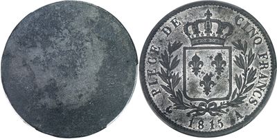 an old silver coin with a coat of arms on it