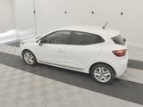 a white car is parked in a garage with a checkered floor