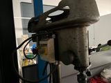 a drill that is sitting on top of a table
