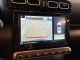 a picture of a car dashboard with a gps device in it