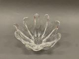 a glass bowl that is sitting on a table