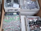 a cardboard box filled with many different types of electronic equipment