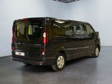 a black van that is parked inside of a building