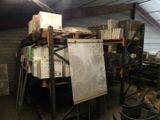 a picture of a room with a lot of boxes on the shelves