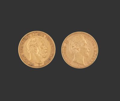 deux souverains d'or, l'un à l'effigie d'un homme et l'autre à celle d'une femme