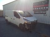 a white van parked in front of a building