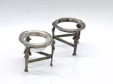 pair of antique silver plated candlesticks on stand