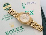 an image of a rolex watch sitting on top of a stack of papers