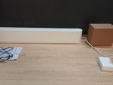 an image of a table with a speaker and a box on top of it