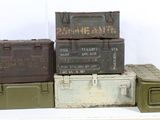 many different types of military boxes stacked on top of each other