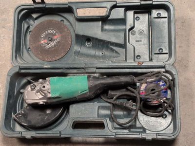 a tool in a case that is sitting on the floor