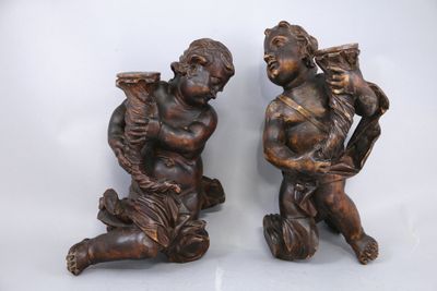 pair of antique bronze figurines of a boy and a girl with harps