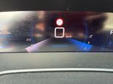 a close up of a car ' s dashboard with a clock on it