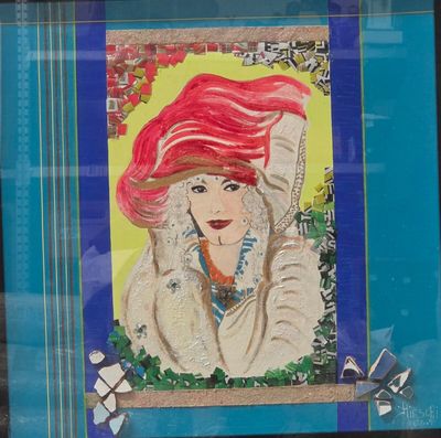 a picture of a woman with red hair in a picture frame