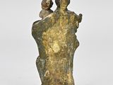bronze statue of a woman holding a child in her arms