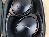 a pair of headphones in a case on a table