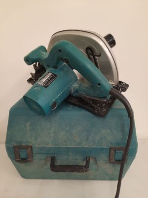 a blue box with a tool on top of it