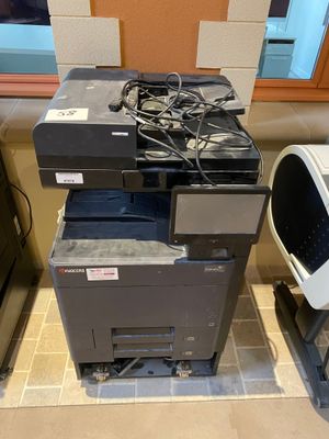 a printer that is sitting on top of a desk
