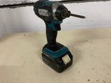 a drill is sitting on top of a table in a room