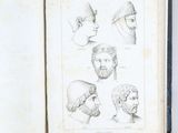 an open book with drawings of men ' s heads and beards