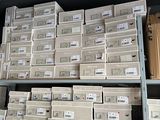 a lot of boxes that are sitting on a shelf