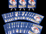 six packs of pokemon cards on display on a black background