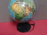 a small globe that is sitting on a table