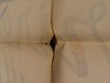 a close up of a piece of paper with writing on it