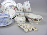 many different types of china on display on the table