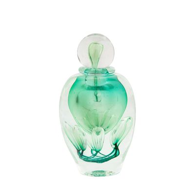 an image of a green glass bottle with a flower inside