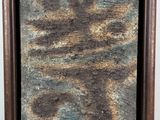 a painting of a brown frame with a blue and brown design