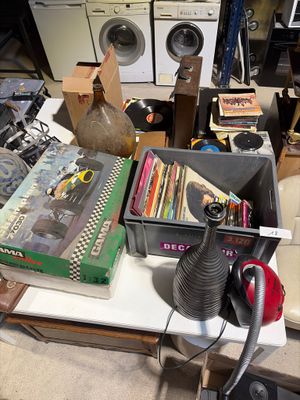 a lot of clutter on the counter in the room