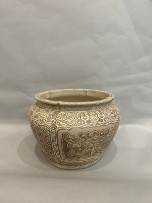 an image of a white vase sitting on top of a white table