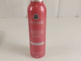 an image of a bottle of body lotion sitting on a table